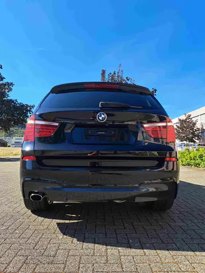 BMW X3 20d xDrive M Sport — SUV diesel performant, équipement premium, entretien impeccable — vista posteriore