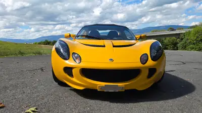Lotus Elise 1.8 16V 111 SC — Sportive légendaire, 51 000 km, jaune éclatant — Seitenansicht