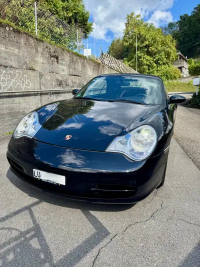 Porsche 911 Carrera 4 Cabriolet — 320 ch, boîte manuelle, 70'000 km — côté