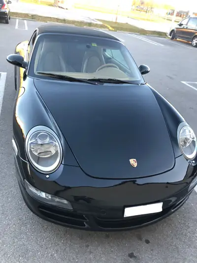 Porsche 911 Carrera S Cabriolet 355 PS — Roadster mythique, sans accident — fianco