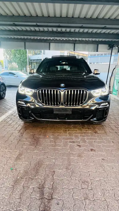 BMW X5 M50i xDrive — SUV coupé haute performance, 530 ch et seulement 44 000 km — Außenansicht