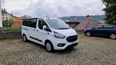 Ford Transit Custom Van Dreamer Capland — Aménagé camping, 28 500 km seulement — côté