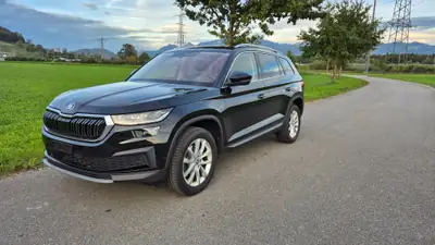 Skoda Kodiaq 2.0 TDI 4x4 — SUV 7 places robuste, diesel performant, 133 000 km — side view