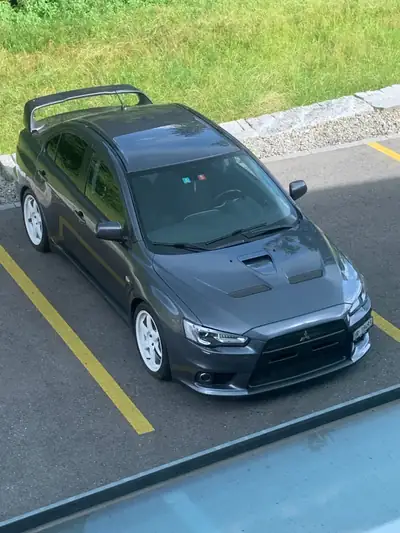 Mitsubishi Lancer Evo X GSR — 367 ch, Tuning J-Spec officiel, impeccable — Miniature 9