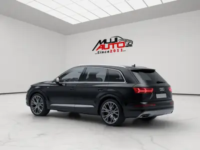 Audi Q7 50 TDI Quattro — SUV premium 7 places, motorisation puissante et équipement complet — Heckansicht