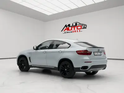 BMW X6 M50d Steptronic — SUV coupé diesel 381 ch, 5 places rarissime — Heckansicht