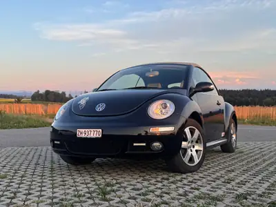 VW Beetle 1.8 20V Turbo Sixty — Cabriolet mythique, moteur turbo performant — vista esterna