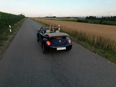 VW Beetle 1.8 20V Turbo Sixty — Cabriolet mythique, moteur turbo performant — fianco