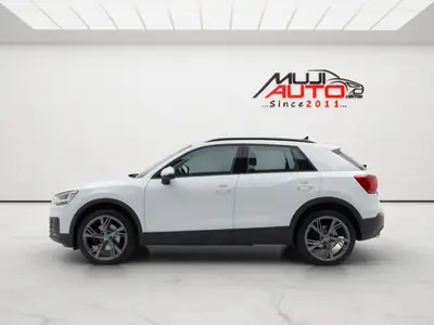 Audi Q2 35 TDI Quattro — SUV compact diesel 4x4, révision fraîche et pneus neufs — fianco