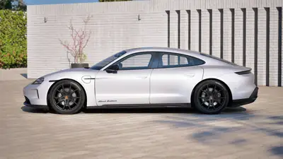Porsche Taycan 4 Black Edition 104 kWh — Berline électrique haute performance, 14'000 km seulement — fianco