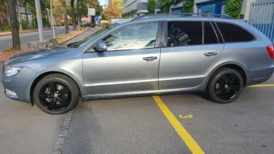 Skoda Superb Combi 2.0 TDi Elegance — Break spacieux, moteur fiable et récemment révisé — Seitenansicht