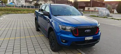 Ford Ranger 2.0 EcoBlue 4x4 Stormtrak — Pickup robuste, faible kilométrage, équipements premium — Seitenansicht