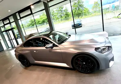 BMW M2 Coupé Steptronic — Performance 460 ch, M Race Track Paket, Premier propriétaire — rear view
