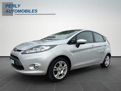 Ford Fiesta 1.4 16V Trend 2012 — Citadine fiable avec 2 jeux de roues inclus — fianco