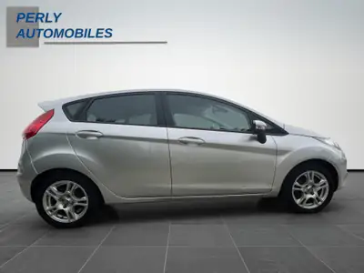 Ford Fiesta 1.4 16V Trend 2012 — Citadine fiable avec 2 jeux de roues inclus — Miniatura 7