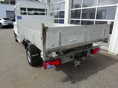 MAN TGE 3.180 4x4 Automat — Utilitaire robuste 4x4, boîte automatique, 115'000 km — fianco