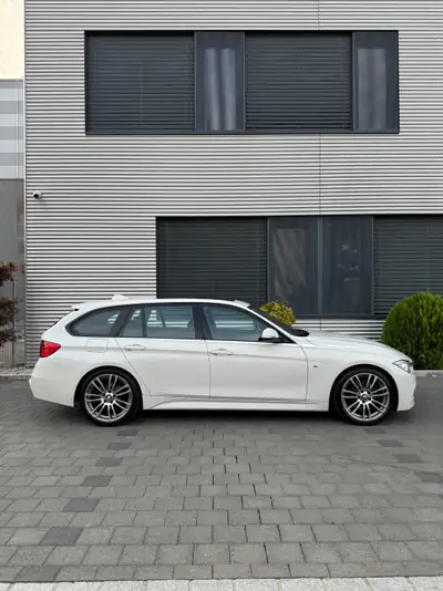 BMW 328i Touring — Break élégant, motorisation efficace et spacieuse — Heckansicht