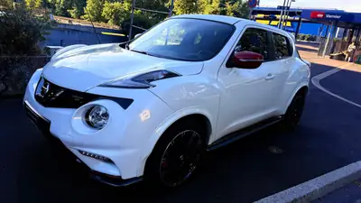 Nissan Juke 1.6 DIG-T Nismo RS 4x4 — SUV compact sportif, transmission Xtronic, 114'000 km — fianco