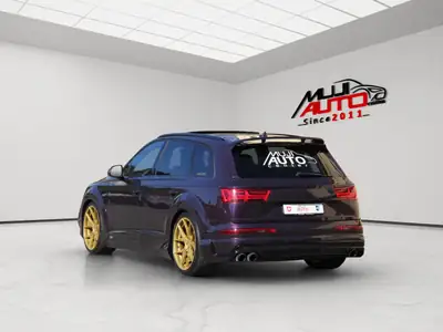 Audi SQ7 4.0 TDI — SUV 7 places performant, bodykit ABT, finition violette exclusive — vista posteriore