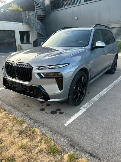 BMW X7 40d xDrive SAG — SUV premium 7 places, motorisation diesel hybride performante — side view
