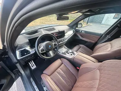 BMW X7 40d xDrive SAG — SUV premium 7 places, motorisation diesel hybride performante — rear view