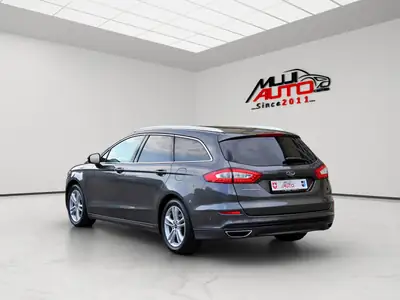 Ford Mondeo 2.0 TDCi Titanium PowerShift — Break spacieux, diesel économique, fraîchement révisé — Heckansicht