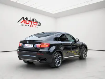 BMW X6 M50d Steptronic — SUV coupé diesel puissant, 381 ch et révision récente — cruscotto