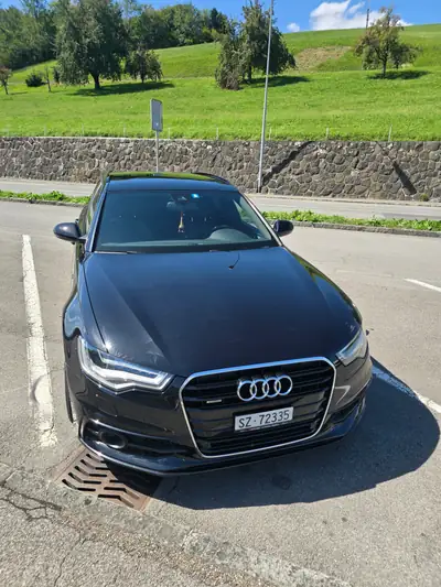 Audi A6 Avant 3.0 V6 TDI 245 quattro — Berline break premium, transmission intégrale — vue extérieure