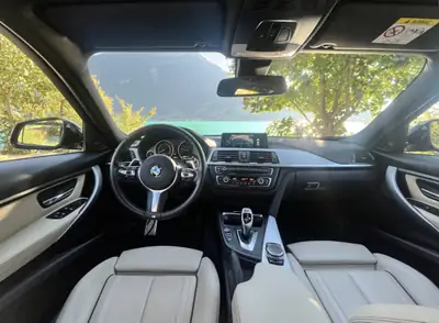 BMW 335i xDrive Touring — Break sportif M-Sport, traction intégrale — Heckansicht