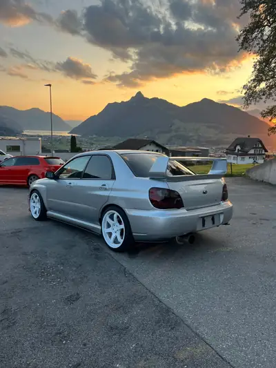 Subaru Impreza 2.0 Turbo WRX — Berline sportive AWD, 224 ch purs — Heckansicht