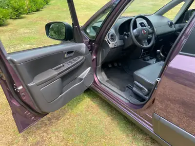 FIAT Sedici 1.6 16V Emotion — Compact polyvalent, 4x4 intégral et très peu kilométré — Heckansicht