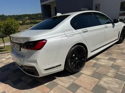 BMW 730d xDrive — Berline prestige diesel, 150'000 km, garantie BMW 2027 — rear view