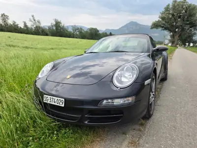 Porsche 911 Carrera 4 Cabriolet — Chef-d'œuvre décapotable, 325 ch et transmission manuelle — Miniatura 12