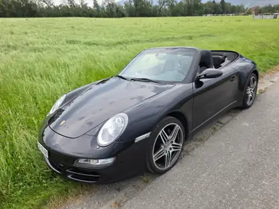 Porsche 911 Carrera 4 Cabriolet — Chef-d'œuvre décapotable, 325 ch et transmission manuelle — Miniatura 14