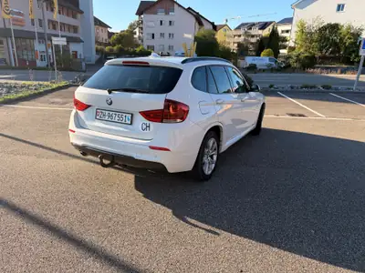BMW X1 xDrive 18d — SUV compact 4x4, fiable et économe — Seitenansicht
