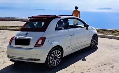 Fiat 500C Cabrio 1.2 Star — Décapotable pétillante, toiture rouge emblématique — vista esterna