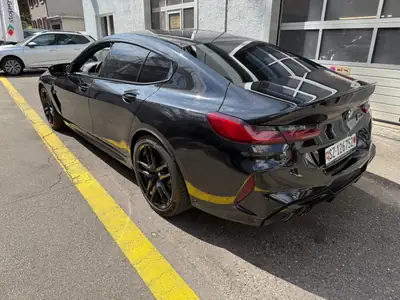 BMW M8 Competition xDrive — Berline de prestige 625 ch, très bas kilométrage — côté
