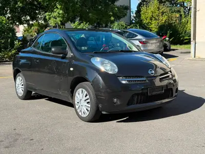 Nissan Micra 1.4 16V Active Luxury — Cabriolet pétillant, entretien réduit — fianco