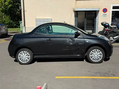 Nissan Micra 1.4 16V Active Luxury — Cabriolet pétillant, entretien réduit — interni