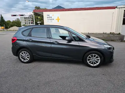 BMW 218 Active Tourer 218i — Monospace compact pratique, entretien réduit — fianco