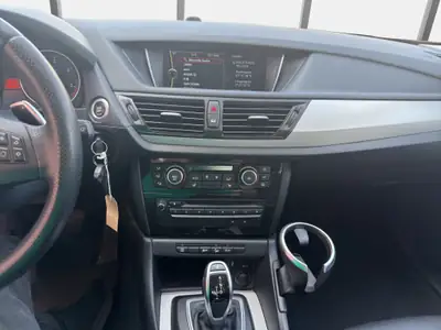 BMW X1 xDrive 20d Steptronic — SUV compact fiable, diesel économique — Miniatura 15