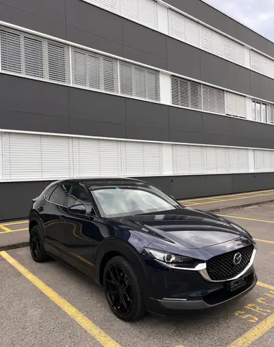 Mazda CX-30 2.0 186 Revolution AWD — SUV compact hybride, 77 400 km, garantie sérénité — Seitenansicht