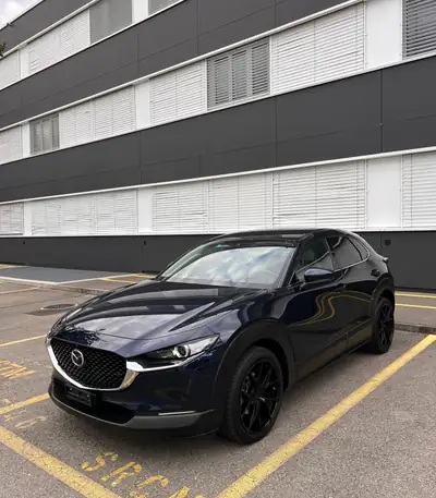 Mazda CX-30 2.0 186 Revolution AWD — SUV compact hybride, 77 400 km, garantie sérénité — Heckansicht