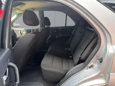 Kia Sorento 3.3 V6 Trend — SUV 7 places puissant, entretien complet, tout-terrain — Miniature 13