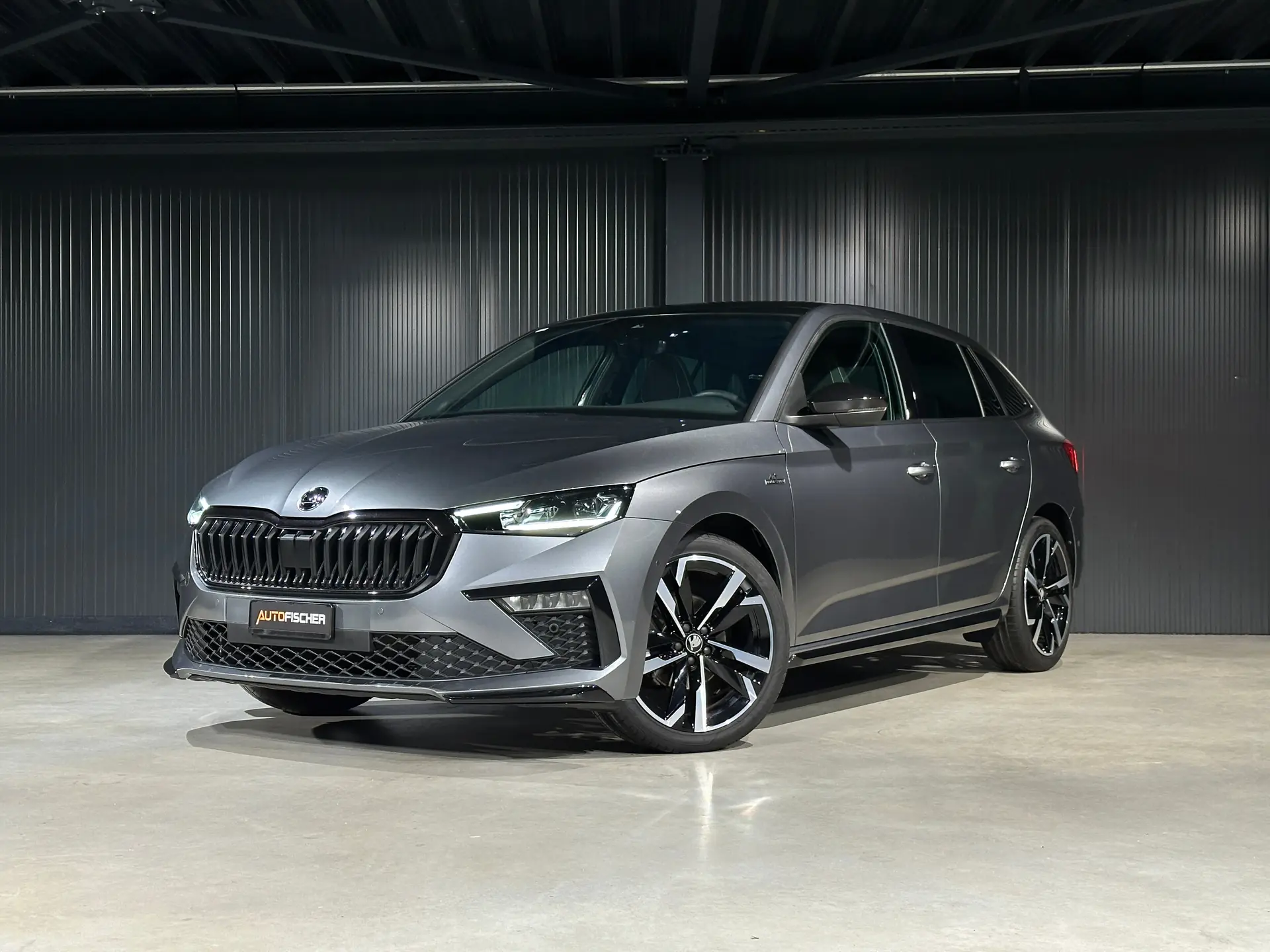 Skoda Scala 1.5 TSI Monte Carlo DSG — Berline compacte dynamique, quasi-neuve avec 5 ans de garantie — vue extérieure