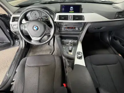 BMW 328i xDrive 2014 — Berline polyvalente, moteur fiable et consommation maîtrisée — dashboard