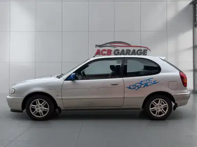 Toyota Corolla 1.6 Linea Sol plus — Berline fiable, boîte auto, parfait état d'entretien — fianco