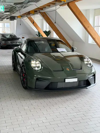 Porsche 911 4.0 GT3 Touring — Sportive légendaire, 510 ch et boîte manuelle — side view
