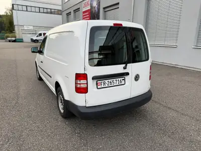 VW Caddy Maxi 1.6 TDI — Utilitaire spacieux, fiable et économe — side view