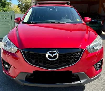 Mazda CX-5 2.2 D Revolution AWD — SUV robuste, équipé 4x4 et pneus hiver inclus — tableau de bord
